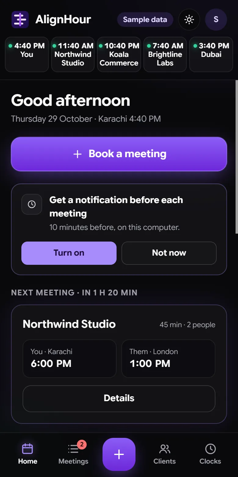 AlignHour web app home: clocks at the top, Book a meeting button, turn on notifications, and the next meeting in your time and theirs